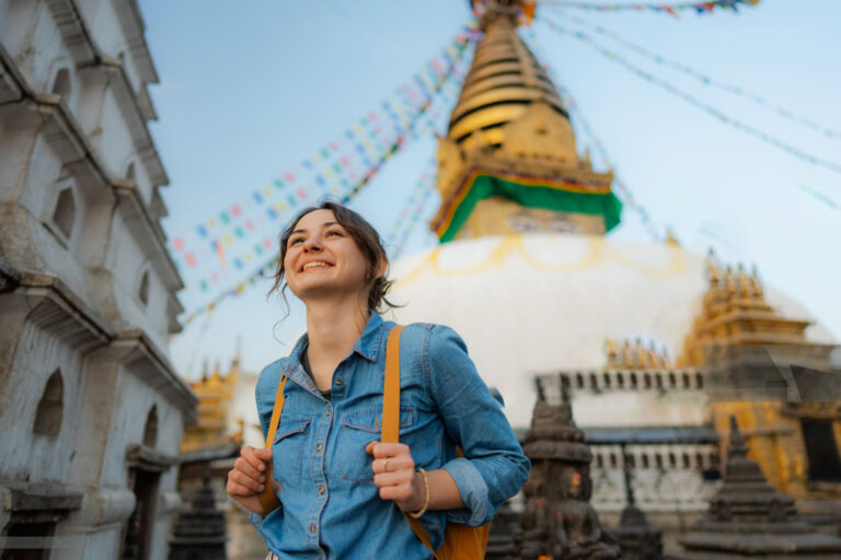 Female tourist exploring monkey temple in Kathmandu